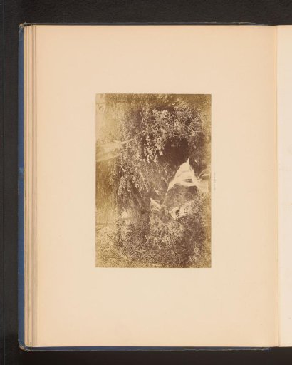 Man fishing by a waterfall in the Lake District