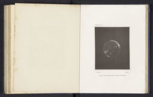 Glass globe cracked by internal pressure