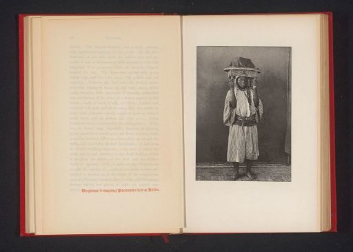 Portrait of an unknown woman with a table on her head