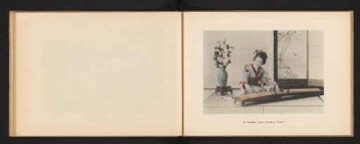 Woman in traditional Japanese clothing playing a koto