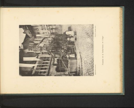 View of the Fontaine de la Samaritaine in Fribourg with children in front of it