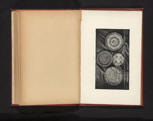Arrangement of four (presumably) porcelain plates