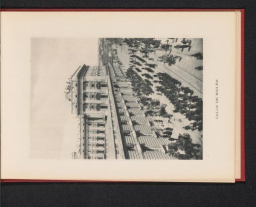 View of the Calle de Bailén in Madrid with a parade of presumably military personnel