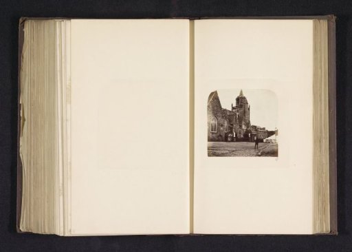 View of the north side of the church and a crucifix in Napoléonville