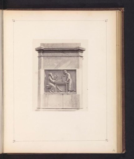 Relief on the monument to Johannes Gutenberg in Mainz, depicting Johannes Gutenberg showing block letters