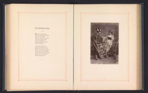 Man and woman in costume by a fence