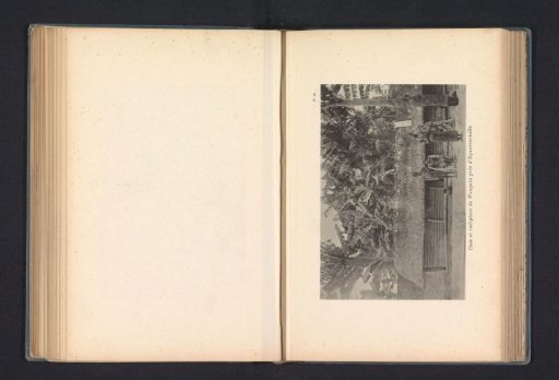 Four inhabitants of Wangata in front of a wooden house