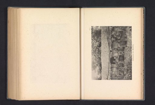 Inhabitants in front of a house in Mumbia