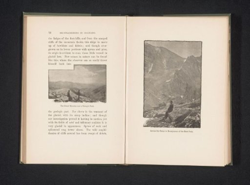 Two men looking out over a valley