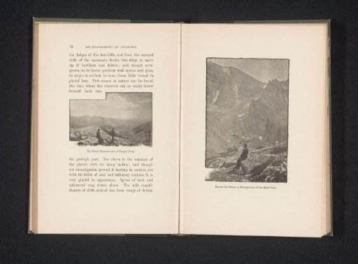 View of a seated man in the mountains