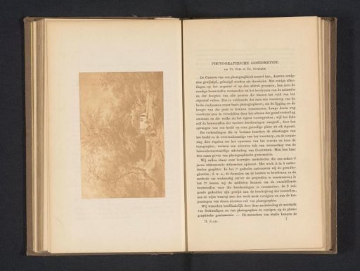 Photographic reproduction of a print with a house in a forest