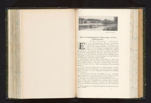 View of a river, with a village in the background