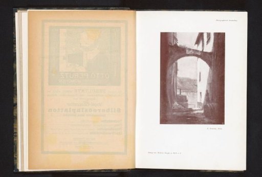 Photographic reproduction of a drawing or painting of a gateway between two streets