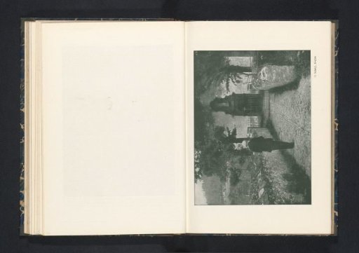 Man Standing on a Path Leading to a Cemetery