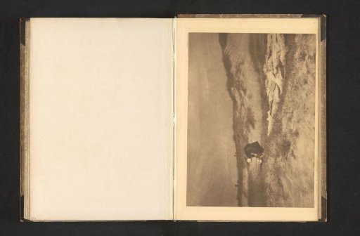 Woman washing clothes in the dunes
