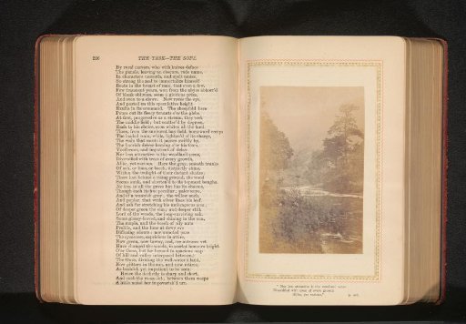 View of a river, with a woman on the shore