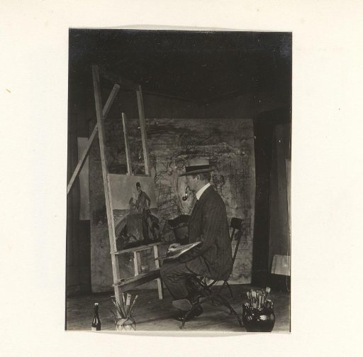 Man in a painter's studio