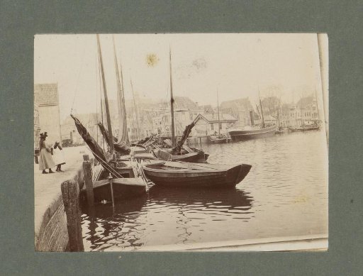 Moored sailing and rowing boats