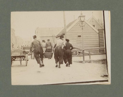 Unknown persons carrying a basket