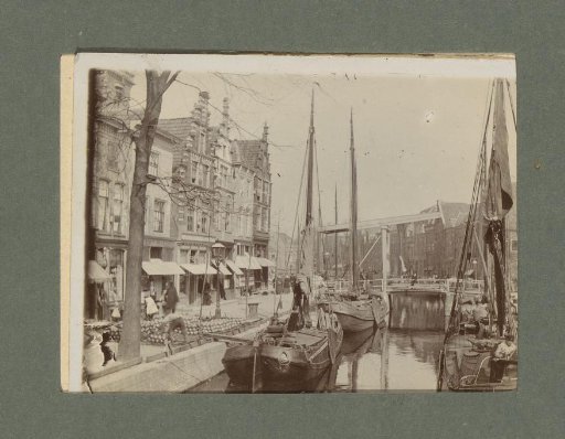 View of sailing boats in the Turfhaven with the Pakhuisbrug in Hoorn in the background