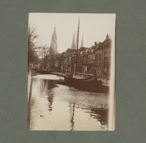 City view with a sailing boat on the water