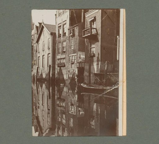 View of houses along the Wijnhaven towards the Grote or Onze-Lieve-Vrouwekerk in Dordrecht