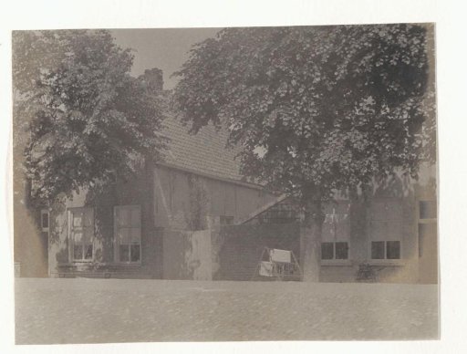 Houses with drying laundry in front, probably in Volendam