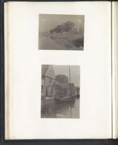 Quay with houses and a sailing boat, probably near Volendam
