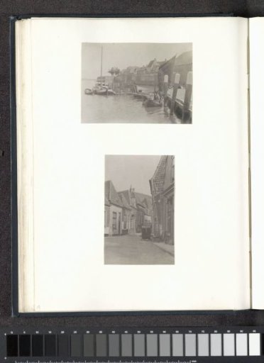 Quay with ships in Woudrichem, with the city wall in the background