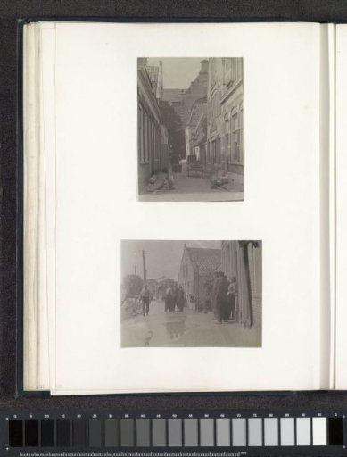 Men in Volendam costume on a dike
