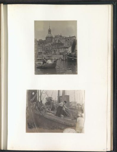 Man in Volendam costume standing in a sailing ship holding a staff
