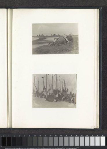 Three men in Volendam costumes sitting on a quay