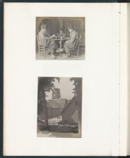 Portrait of three men in Volendam costume, seated at a table