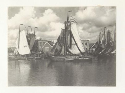 Sailing boats at a quay in Volendam