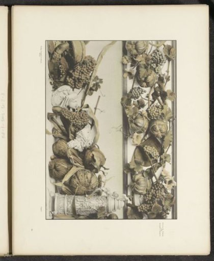 Decorative group with grape clusters, pumpkins and masks