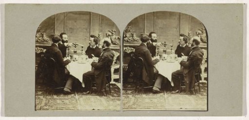 Four Gentlemen Seated at a Table
