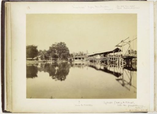 The office of the Firm Sandel with the hanging bridge over the Wampoe river, Tandjong Poera, Langkat Sumatra