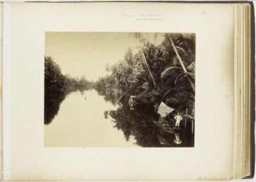 European on a raft in the Wampoe river, Tandjong Poera, Langkat Sumatra
