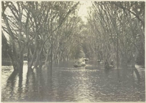 Boats navigating the flooded streets of Banjir, Langkat Sumatra