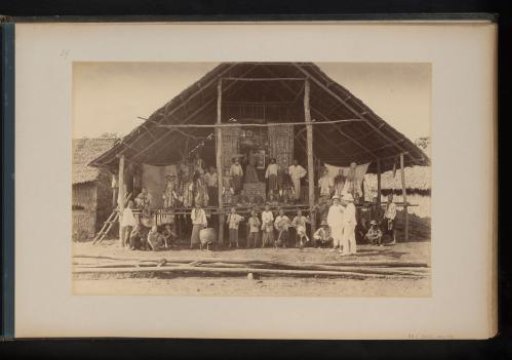 Group of people in front of a Chinese theater at the Ludwigsburg Plantation, Sumatra