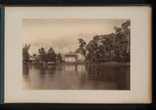 View of a building where tobacco is shipped from the plantation in Kampong-Bakaru, Sumatra