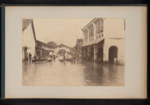 View of a street in Tandjong Poera, Sumatra, during a flood