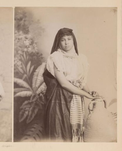Portrait of an Arab woman leaning on a jar, Egypt