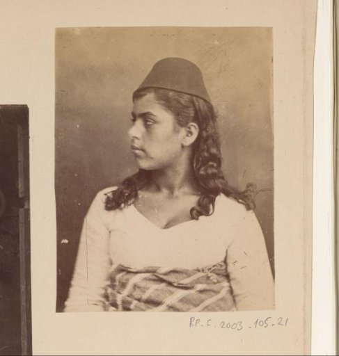 Portrait of an Arab girl with a fez, Egypt