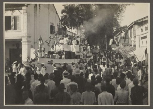 Parade with pageant wagons in the streets of the capital of the province of Langkat
