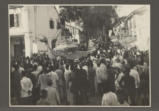 Parade with pageant wagons in the streets of the capital of the province of Langkat