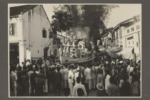 Parade with pageant wagons in the streets of the capital of the province of Langkat