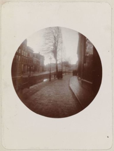 Album page with round Kodak photographs of Leeuwarden