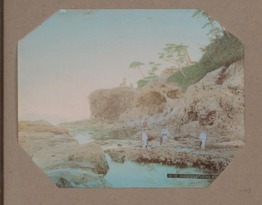 Men and women on the shore at Chigogafuchi on Enoshima, Japan