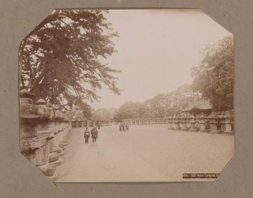 Five hundred stone lanterns along a path in a park in Shiba, Tokyo, Japan